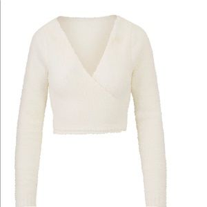 Skims cozy wrap top in the color Bone